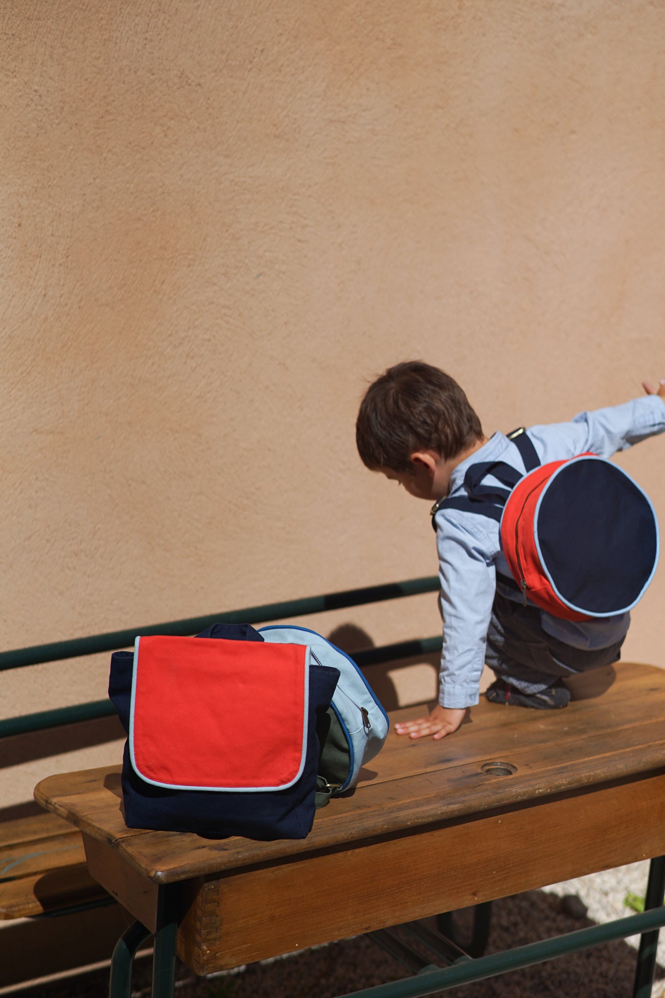 Sac à dos enfant rond rouge / bleu marine